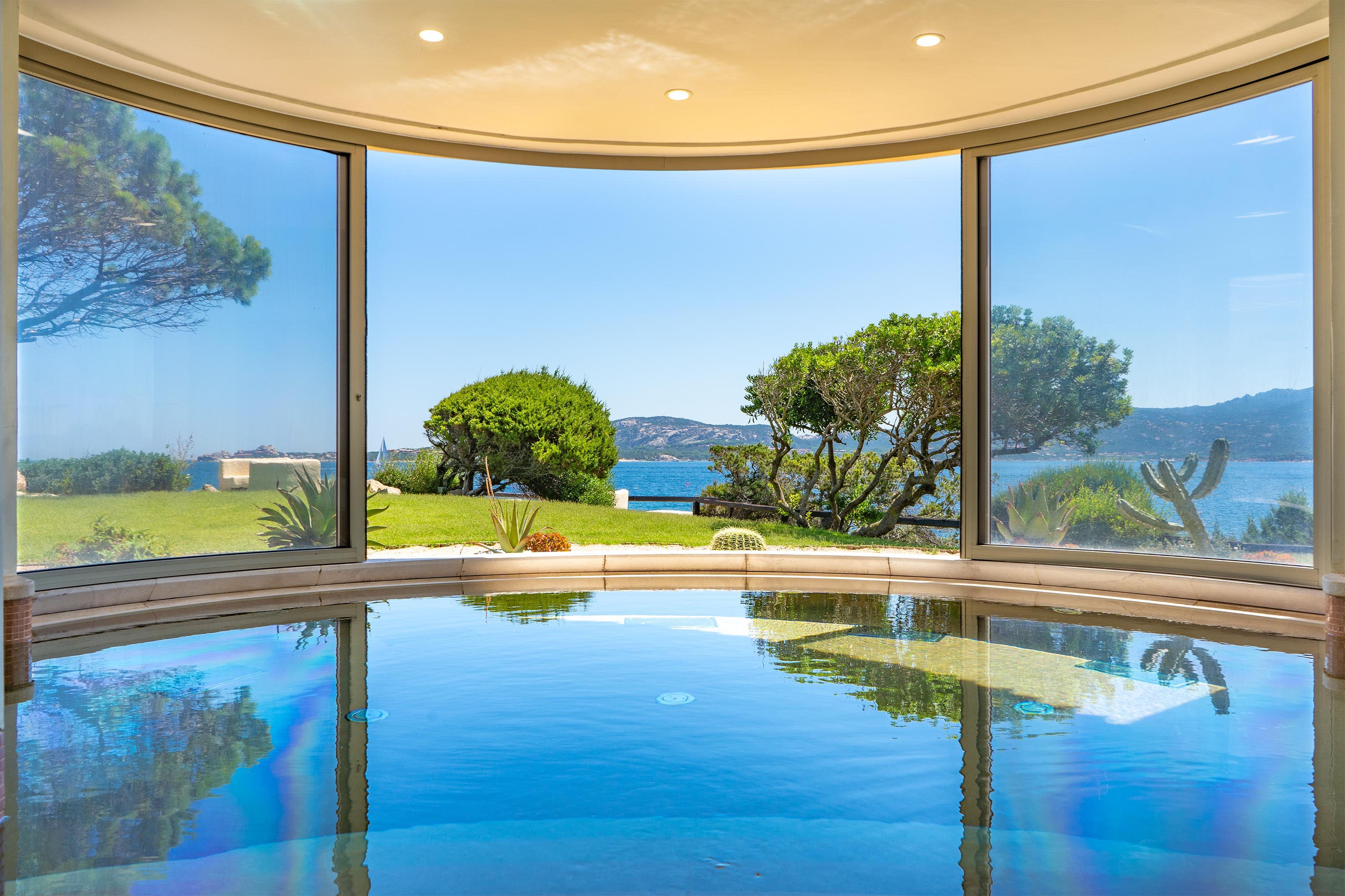 Interior living area at Baia Holiday Isuledda in Cannigione